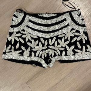 Black shorts with white sequins and beading